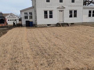 Broom-finished concrete patio slab with a poured step on the Eastern Shore of Maryland