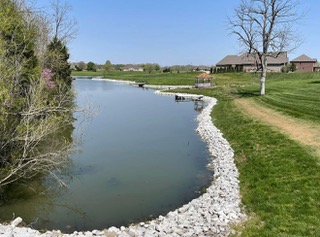 Pond bank stabilized with riprap stone on the Eastern Shore of Maryland